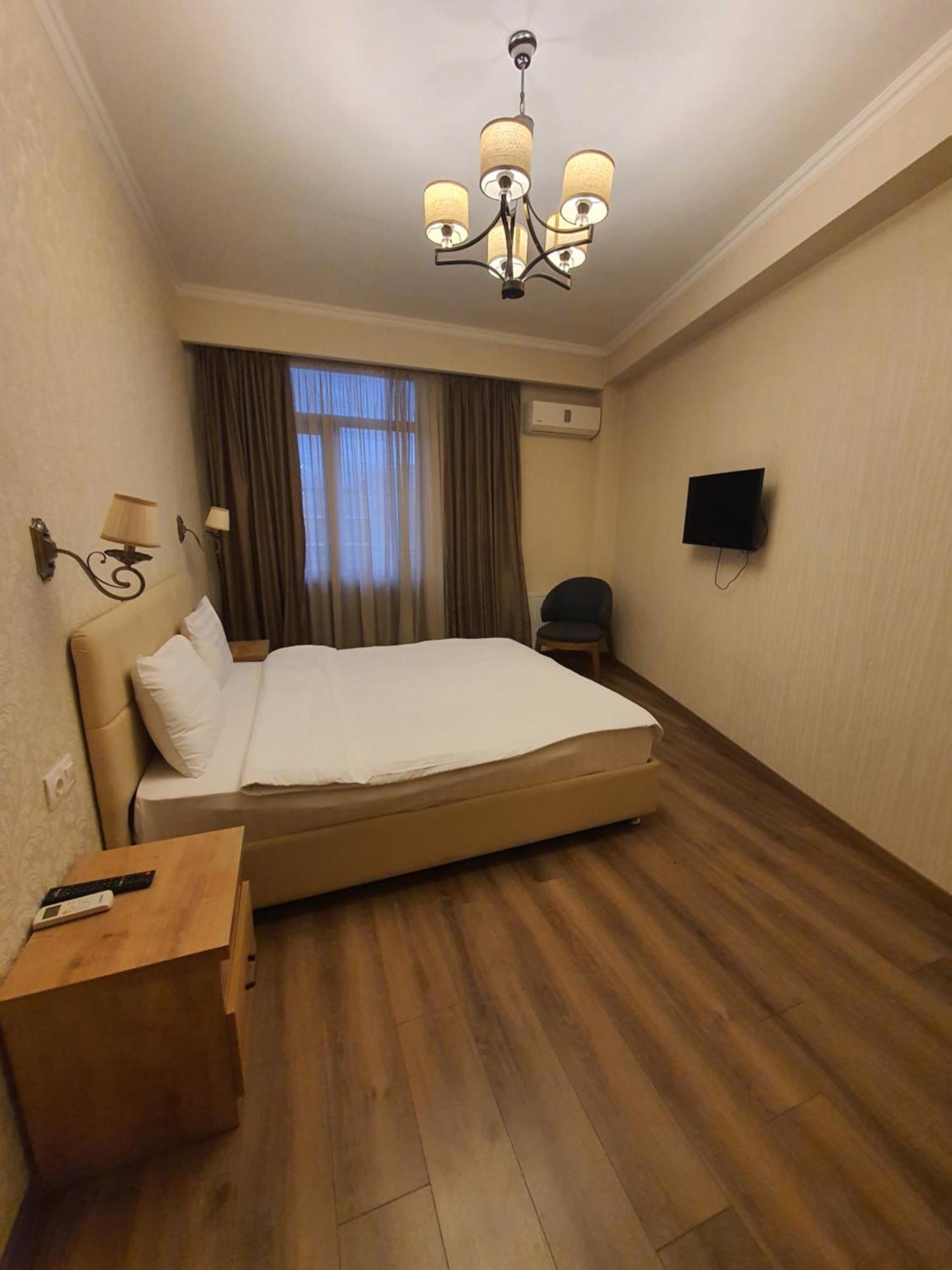 Dat Exx Apartments Тбилиси Стая снимка